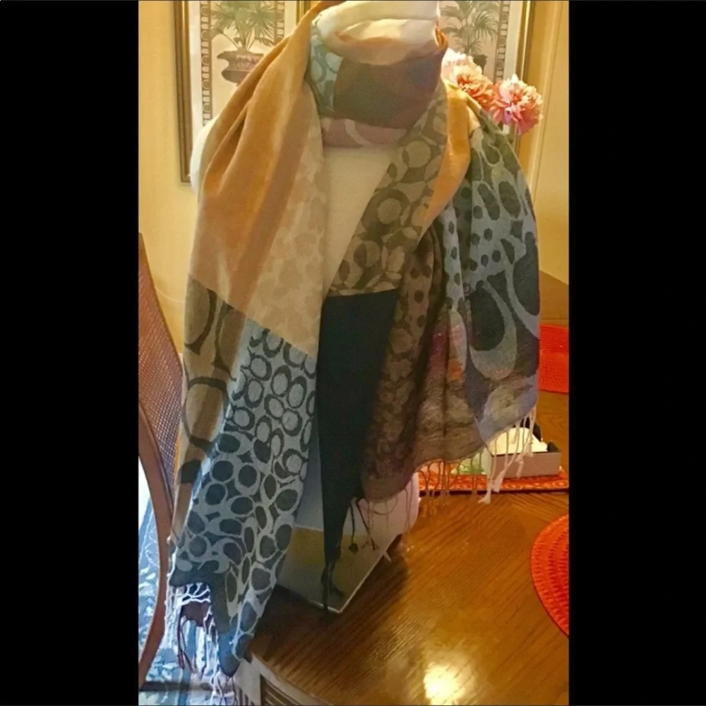 Pashmina scarf NWT has tassels ready with Fall colors. 70”x54” warm & co…